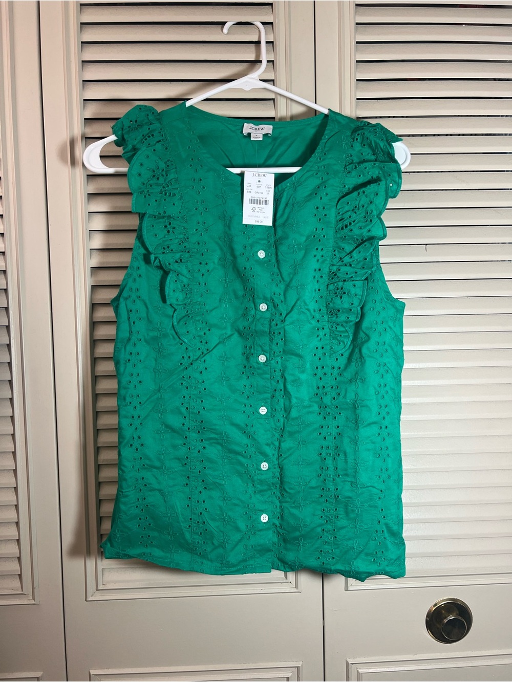 Eyelet flutter-sleeve top